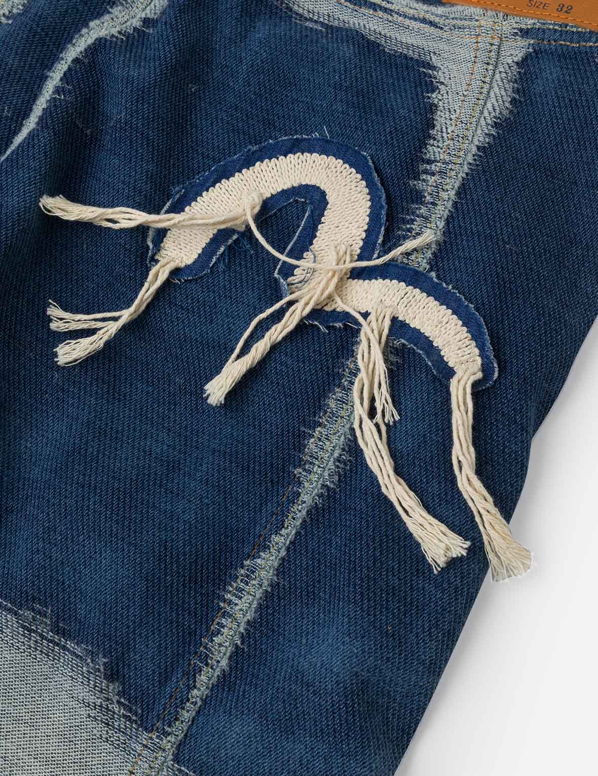 破損海鷗刺繡時尚版型牛仔褲